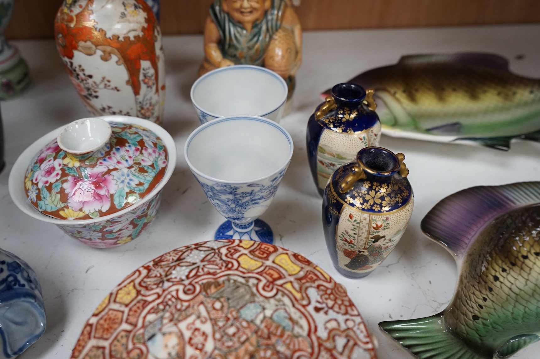 A collection of mostly Chinese and Japanese ceramics to include famille rose, satsuma, kutani etc. tallest 45cm